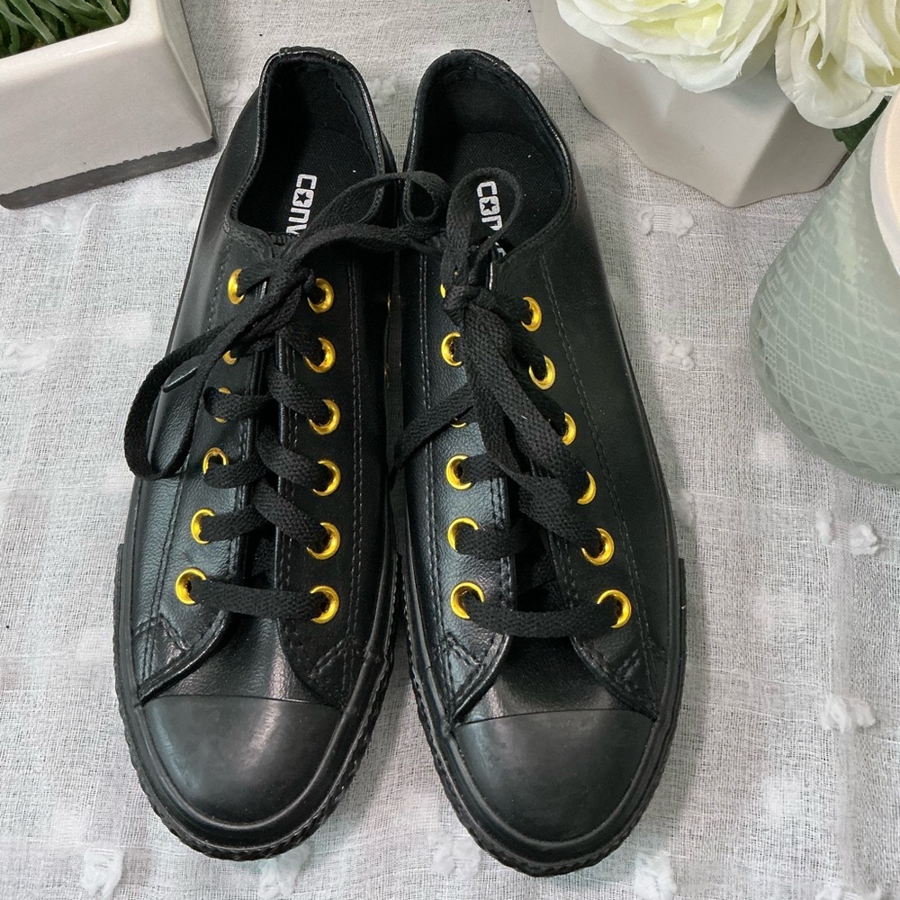 Black Sneakers with Gold Eyelets